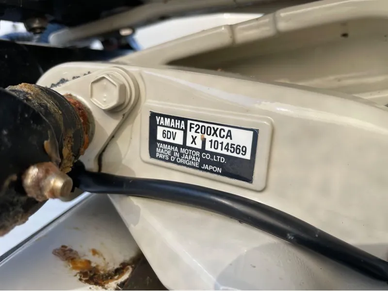 Slide: The Image of Yamaha F200XCA engine label on 2021 Key West 263FS boat. - 21