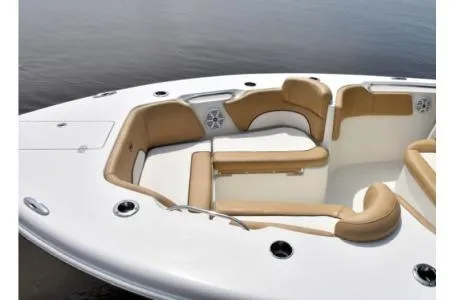 Slide: The Image of 2021 Key West 263FS boat with tan seating and sleek design. - 28