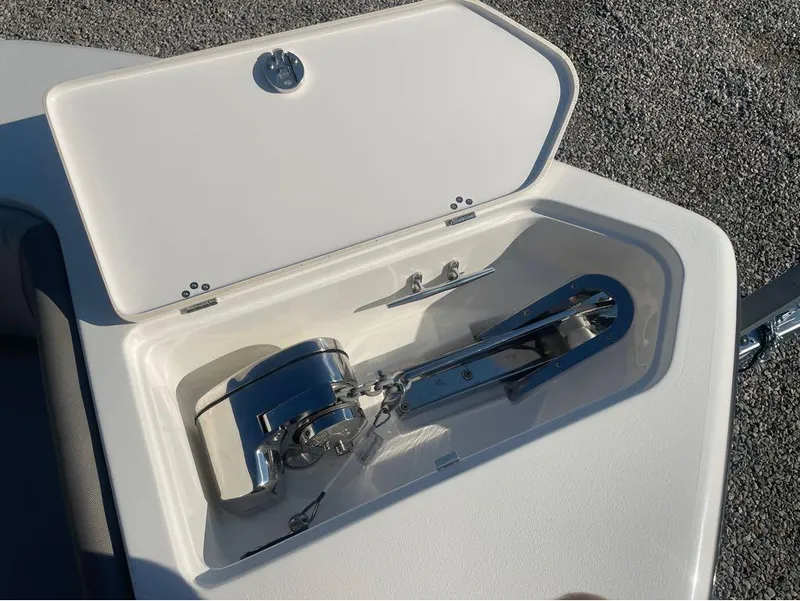 Slide: The Image of 2021 Key West 263FS boat anchor compartment with stainless steel hardware. - 41