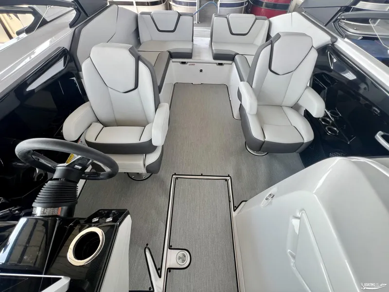Slide: The Image of 2025 Yamaha AR250 boat interior with modern seating and sleek design. - 4