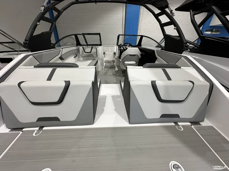 Slide: The Image of 2025 Yamaha Boats AR220 interior with modern seating and sleek design. - 13