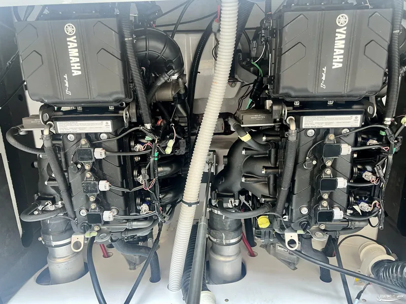 Slide: The Image of 2025 Yamaha AR220 boat engines, detailed view of dual motors and components. - 4