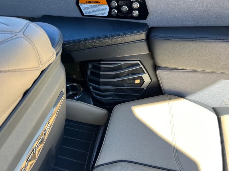 Slide: The Image of Interior of 2022 Nautique Super Air Nautique G23 Paragon with premium speaker system. - 14