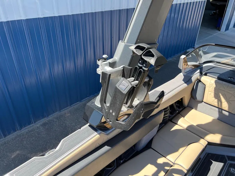 Slide: The Image of 2022 Nautique Super Air Nautique G23 Paragon interior with advanced wakeboard rack. - 15