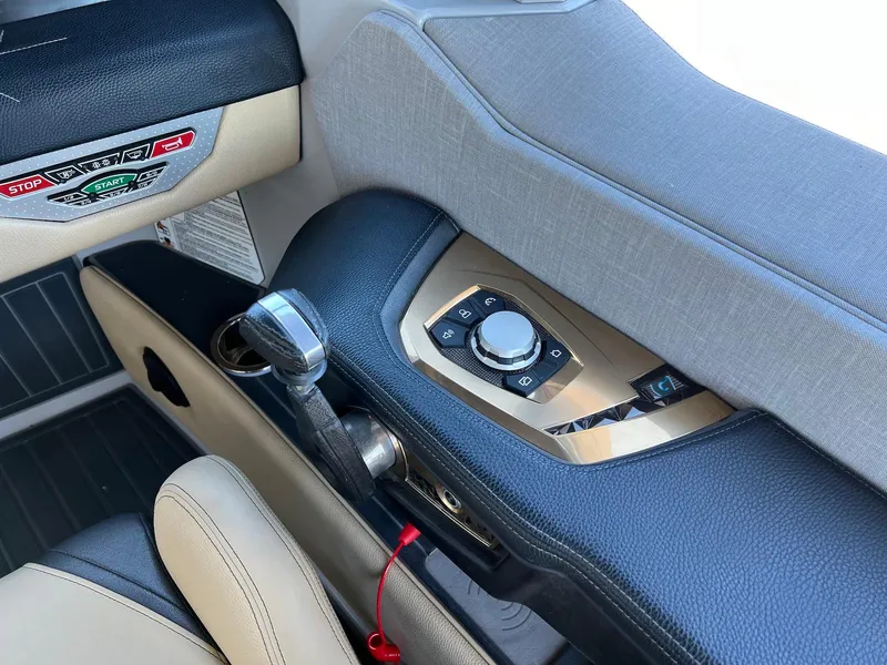 Slide: The Image of 2022 Nautique Super Air Nautique G23 Paragon interior controls and dashboard detail. - 24