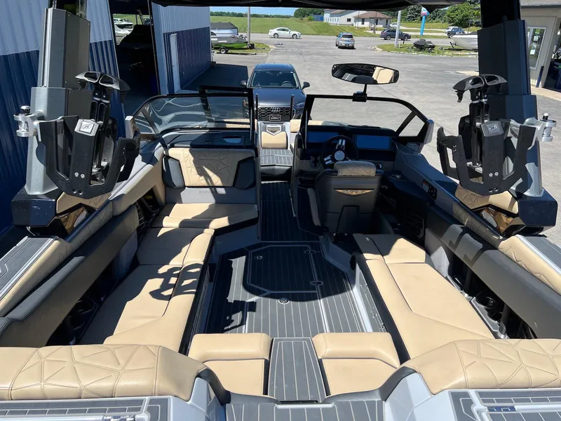 Slide: The Image of 2022 Nautique Super Air Nautique G23 Paragon interior with luxurious seating and advanced controls. - 6