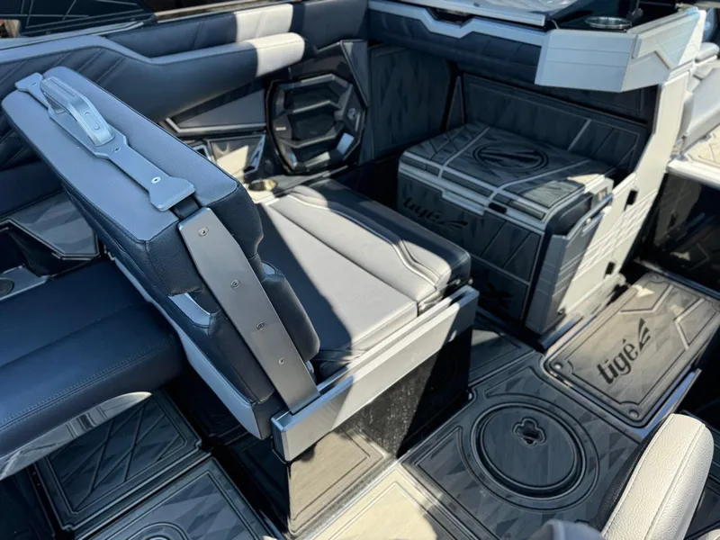 Slide: The Image of 2024 Tigé 23ZX Ultre' interior with sleek seating and modern design elements. - 12