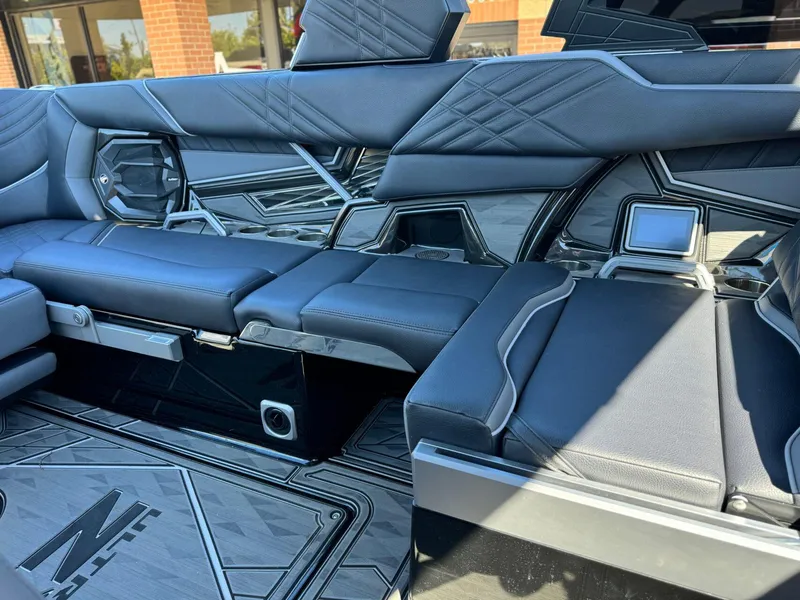 Slide: The Image of Luxurious interior of 2024 Tigé 23ZX Ultre' boat with sleek seating and modern design. - 13