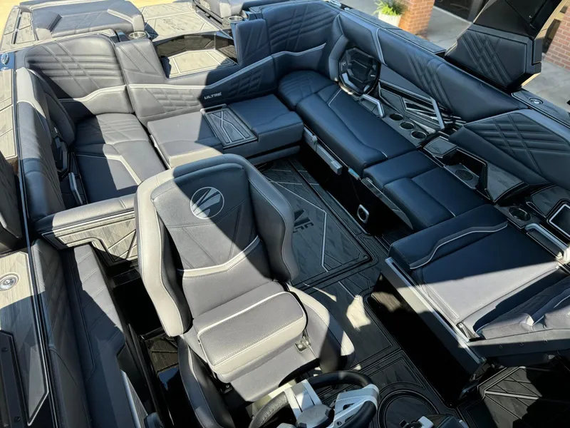 Slide: The Image of 2024 Tigé 23ZX Ultre' boat interior with luxurious seating and modern design. - 16