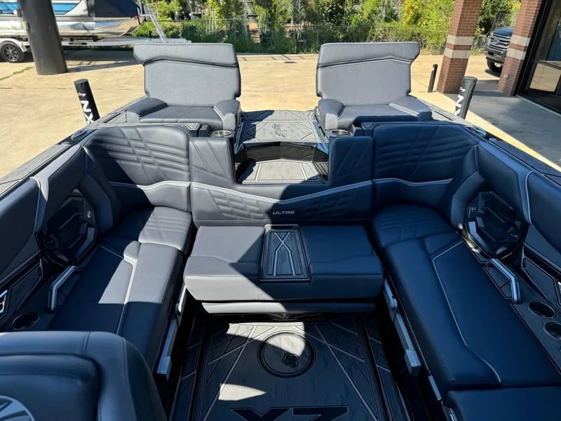 Slide: The Image of Luxurious interior of 2024 Tigé 23ZX Ultre' boat with sleek seating and modern design. - 17