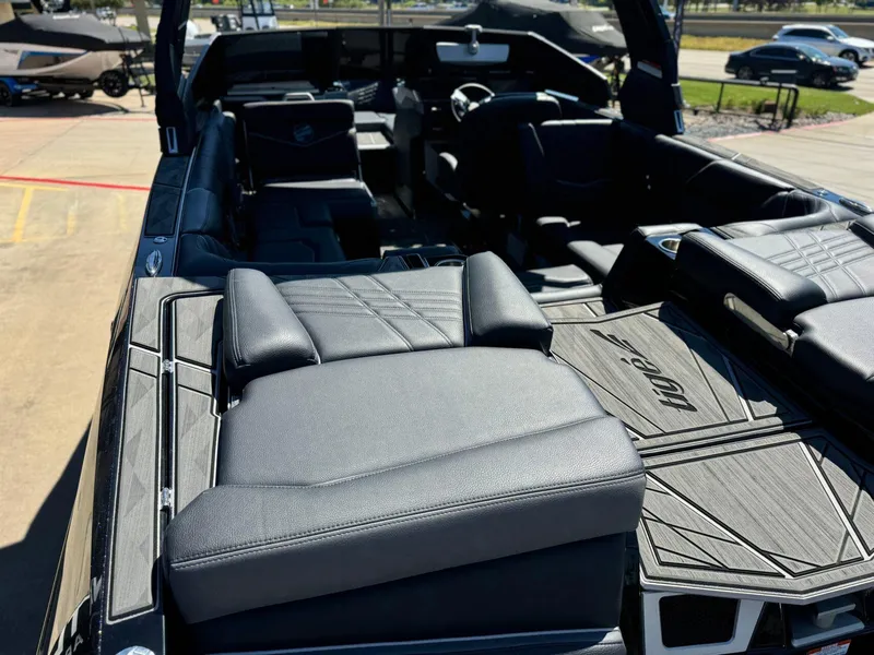 Slide: The Image of 2024 Tigé 23ZX Ultre' boat interior with luxurious seating and modern design. - 8