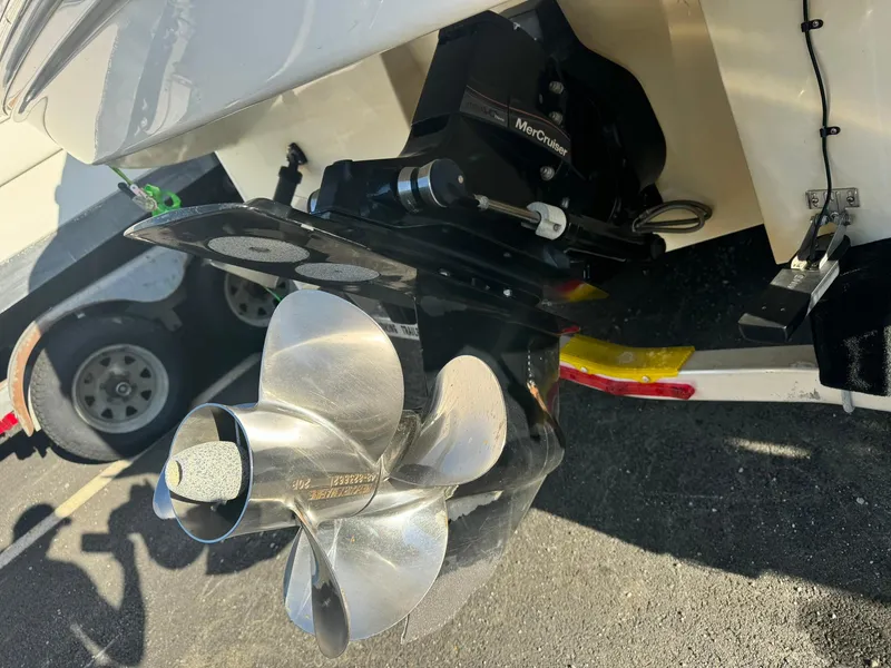 Slide: The Image of Close-up of 2009 Sea Ray 240 Sundancer boat propeller and drive system. - 23