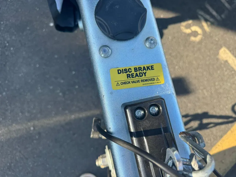 Slide: The Image of Close-up of a 2009 Sea Ray 240 Sundancer's disc brake ready label. - 24