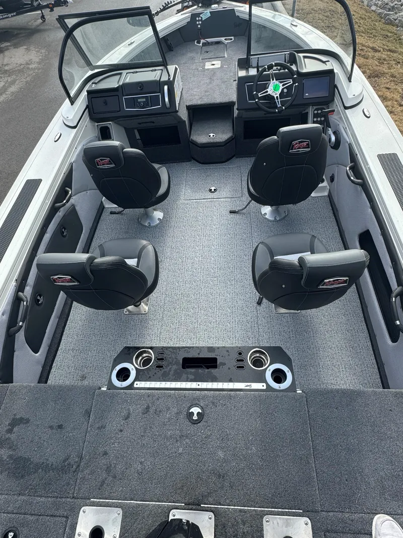 Slide: The Image of 2024 Ranger VX1988 WT boat interior with four seats and modern dashboard. - 4