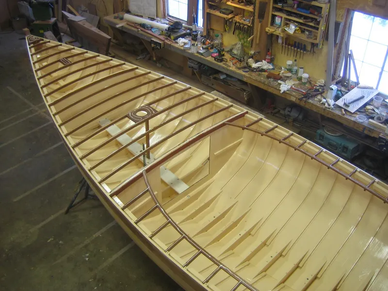 Slide: The Image of Wooden Herreshoff Full-Keel Buzzards Bay 15 boat under construction in a workshop, 2008 model. - 24
