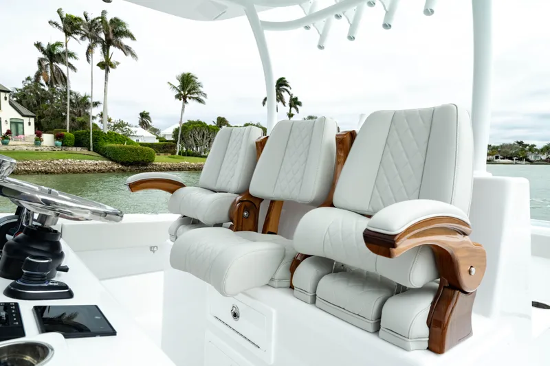 Slide: The Image of Luxury seating on 2025 Front Runner 37 Catamaran, featuring elegant design and waterfront view. - 28