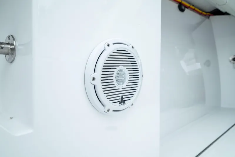 Slide: The Image of White speaker on 2025 Front Runner 37 Catamaran interior wall. - 39