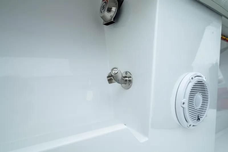 Slide: The Image of 2025 Front Runner 37 Catamaran detail showing speaker and fittings on white surface. - 41