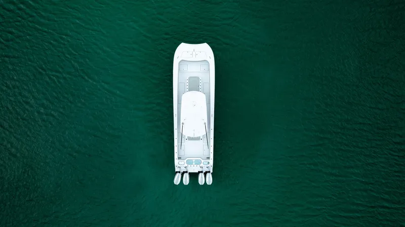 Slide: The Image of 2025 Front Runner 37 Catamaran storage compartment with open lid, showcasing spacious interior. - 6