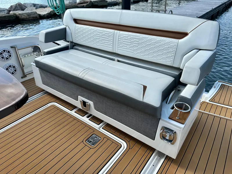 Slide: The Image of 2020 Tiara Sport 34 LS boat seating with elegant design and cup holders. - 12