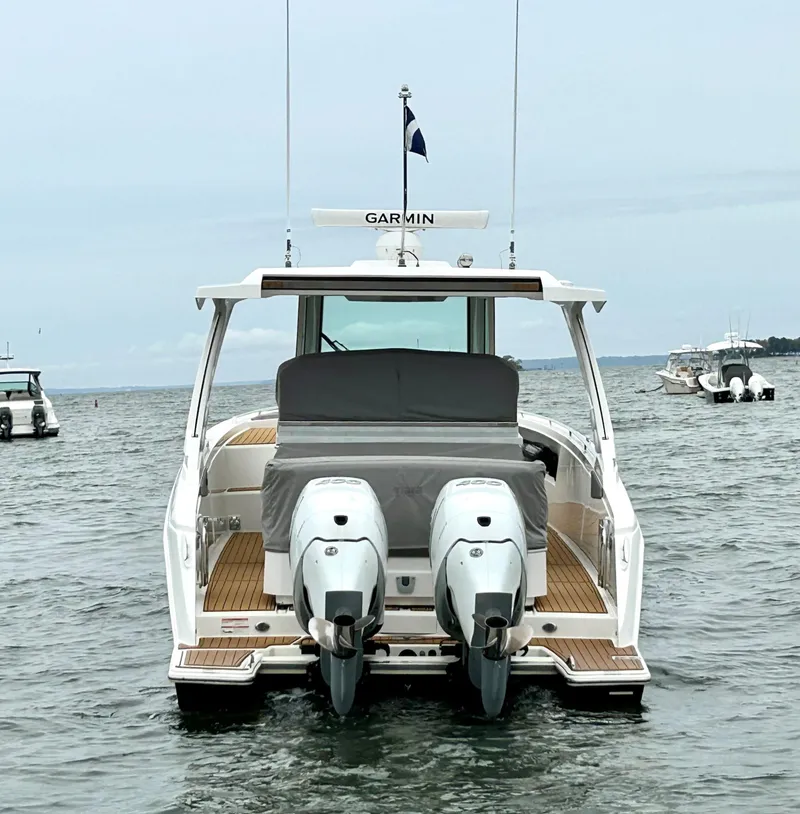 Slide: The Image of 2020 Tiara Sport 34 LS boat with twin engines on the water. - 8