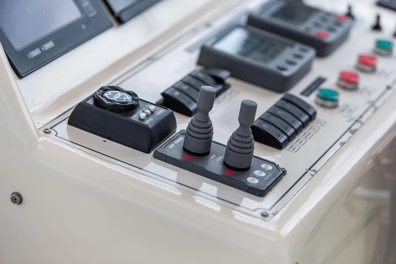 Slide: The Image of Luxurious seating area on 2007 Vicem 54 Classic Flybridge yacht with polished wooden table. - 20