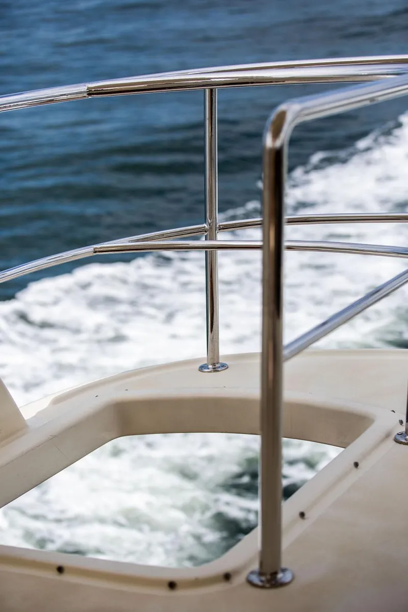 Slide: The Image of Polished wood surface with star inlay on 2007 Vicem 54 Classic Flybridge. - 29