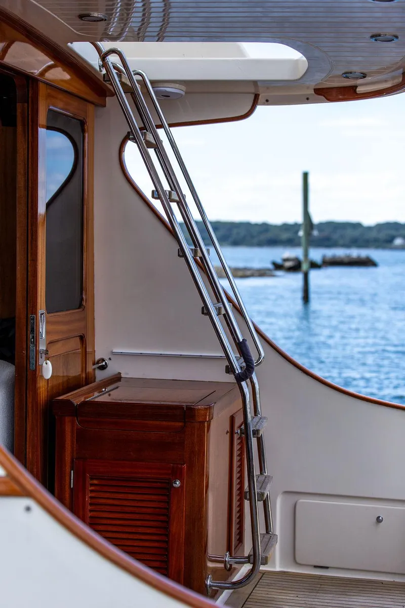 Slide: The Image of Vicem 54 Classic Flybridge 2007 yacht sink with chrome faucet in compact kitchen area. - 30