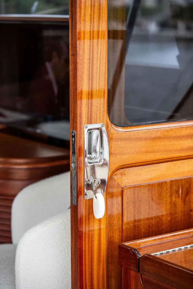 Slide: The Image of Luxurious interior of 2007 Vicem 54 Classic Flybridge yacht with wooden finishes and cozy seating. - 33