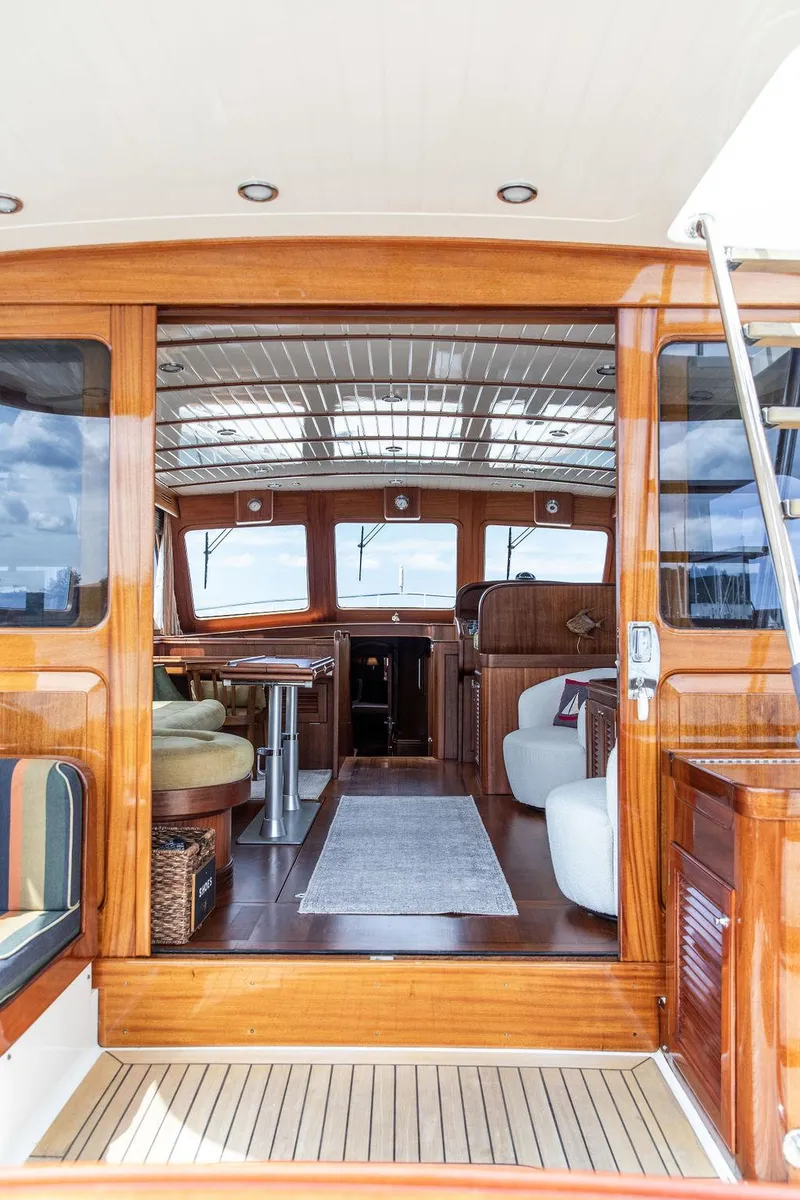 Slide: The Image of 2007 Vicem 54 Classic Flybridge interior with elegant wood finish and comfortable seating. - 34