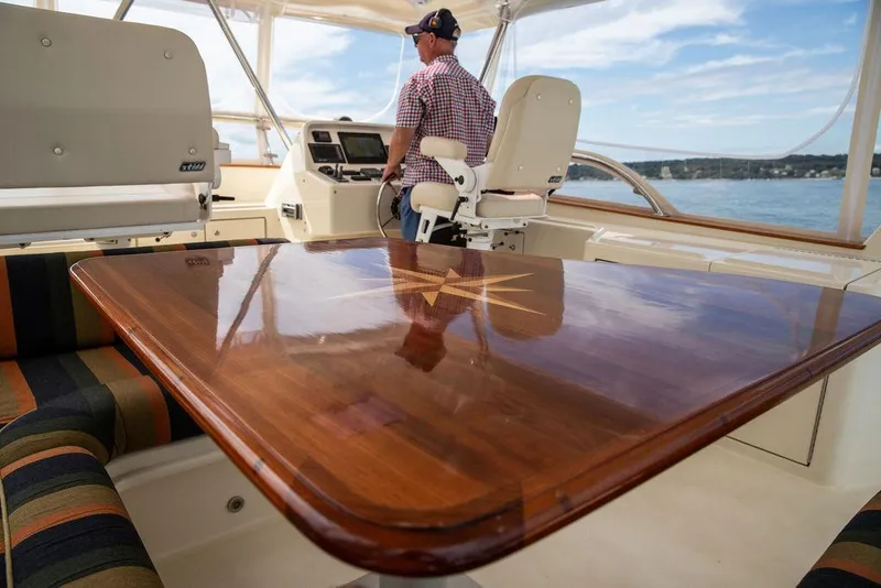 Slide: The Image of Luxurious interior of 2007 Vicem 54 Classic Flybridge yacht with elegant wood finish. - 44