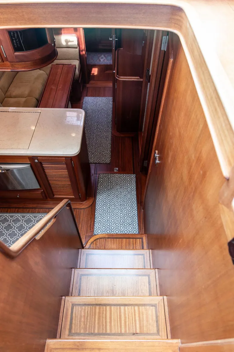 Slide: The Image of Luxurious interior of 2007 Vicem 54 Classic Flybridge yacht with elegant wood finishes. - 46