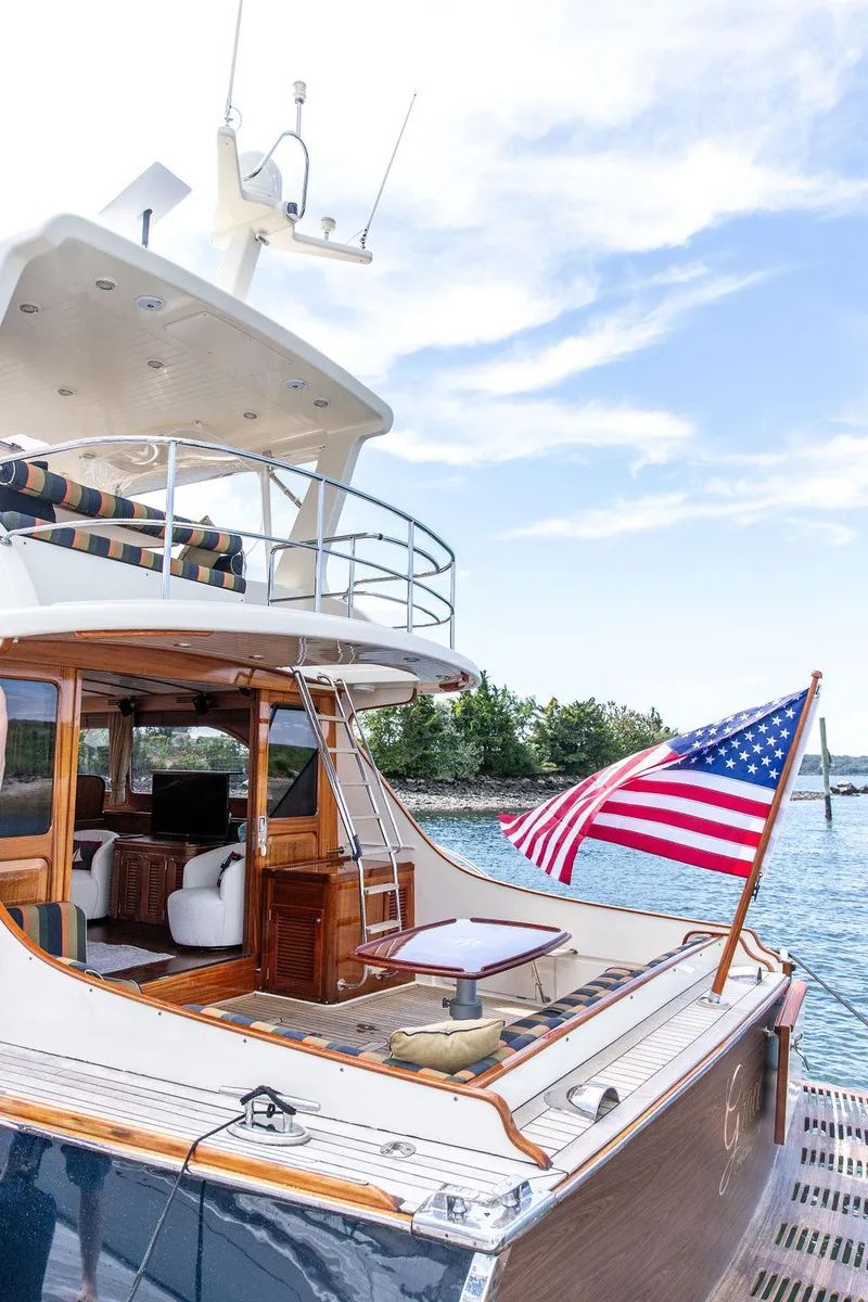 Slide: The Image of 2007 Vicem 54 Classic Flybridge yacht cruising on a scenic waterway. - 7