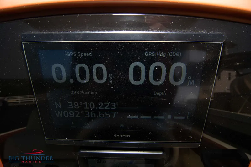 Slide: The Image of 2024 Capoforte FX270 GPS display showing speed and heading at zero. - 25