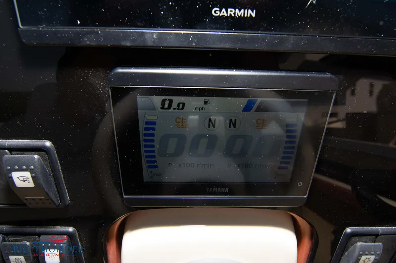 Slide: The Image of 2024 Capoforte FX270 dashboard with Garmin and Yamaha displays. - 26