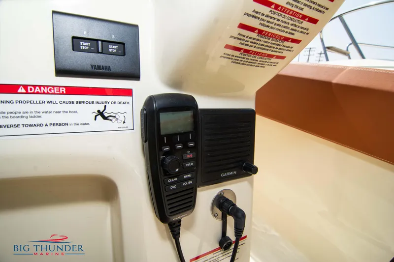 Slide: The Image of 2024 Capoforte FX270 boat dashboard with Yamaha controls and communication equipment. - 30