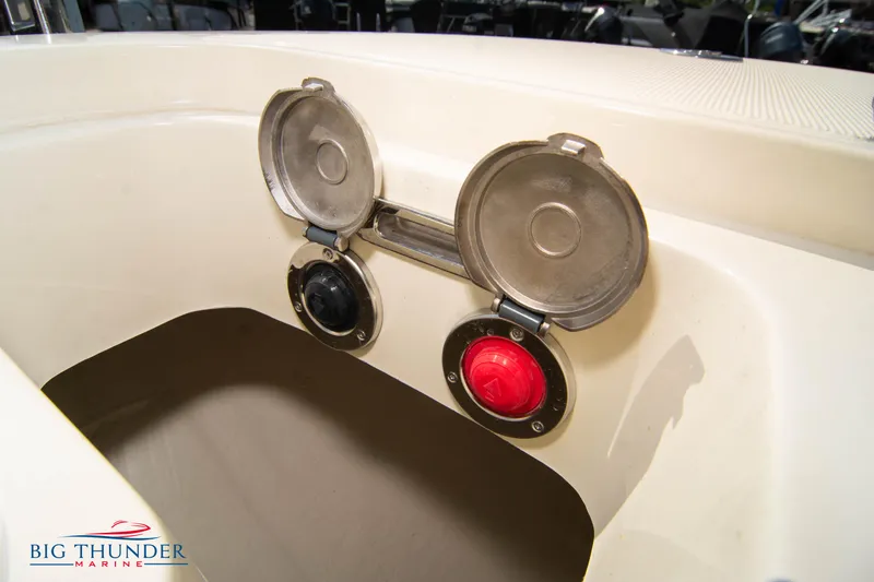 Slide: The Image of 2024 Capoforte FX270 boat fuel caps with open covers, displayed at Big Thunder Marine. - 45