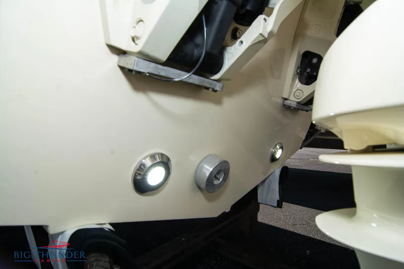 Slide: The Image of 2024 Capoforte FX270 boat with underwater lights and propeller detail. - 5
