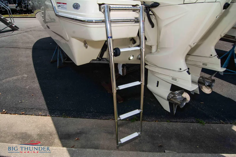 Slide: The Image of 2024 Capoforte FX270 boat with ladder and dual propellers, displayed at Big Thunder Marine. - 7