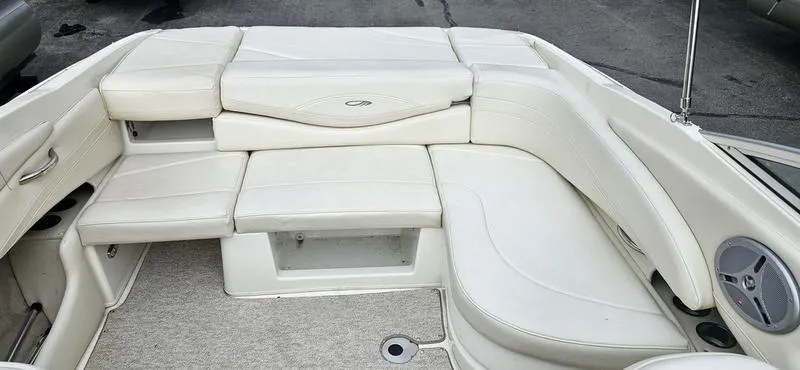 Slide: The Image of 2007 Maxum 2200 SR3 boat interior with white cushioned seating. - 9