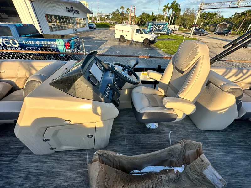 Slide: The Image of Viaggio Diamante 21U 2023 boat interior with captain's chair and control panel. - 10