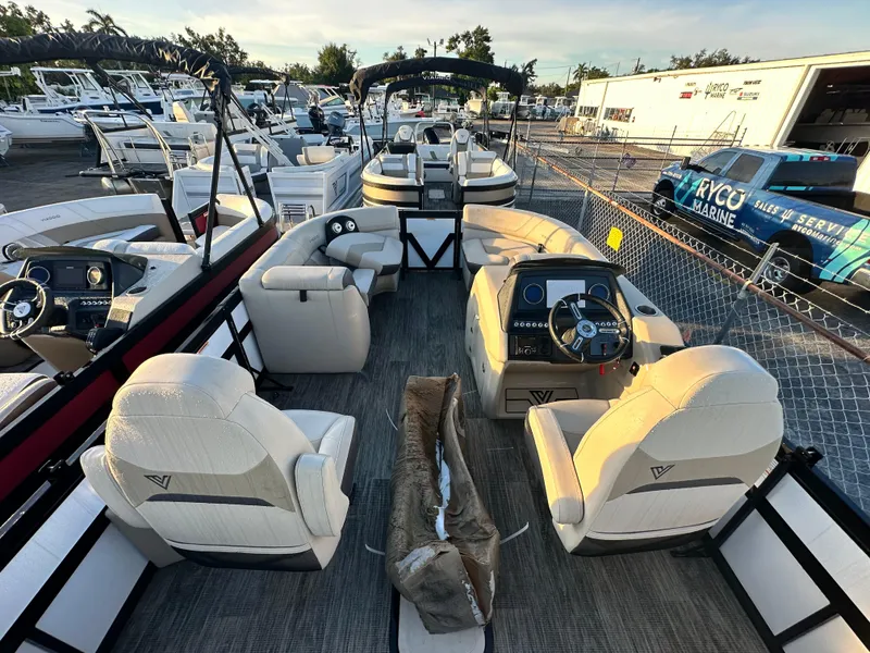 Slide: The Image of Viaggio Diamante 21U 2023 pontoon boat interior with luxurious seating and modern dashboard. - 7