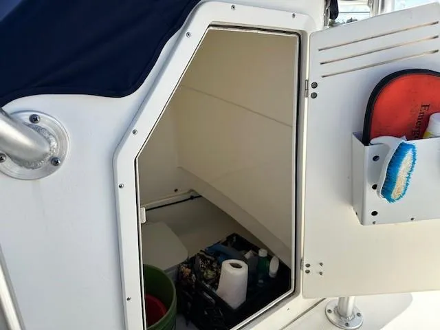 Slide: The Image of Interior storage compartment of a 2017 Boston Whaler 210 Montauk boat. - 12