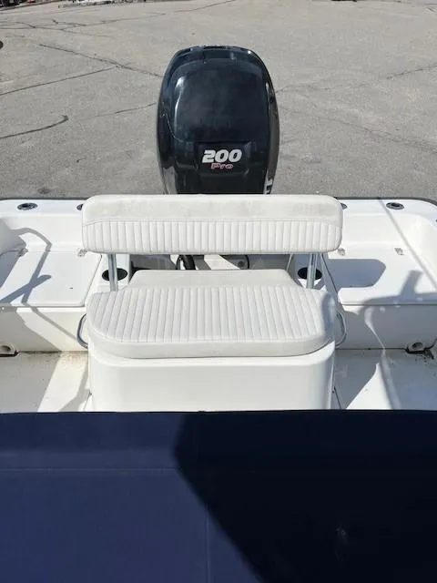 Slide: The Image of 2017 Boston Whaler 210 Montauk boat with 200 HP engine and seating. - 16