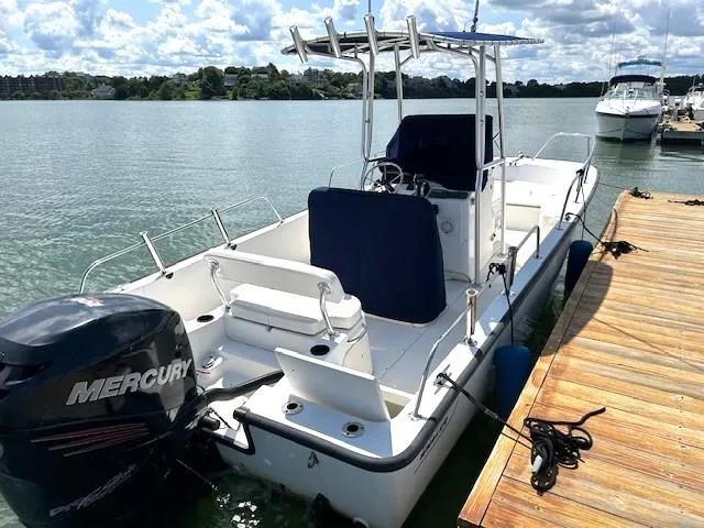 Slide: The Image of 2017 Boston Whaler 210 Montauk boat docked on a sunny day. - 5