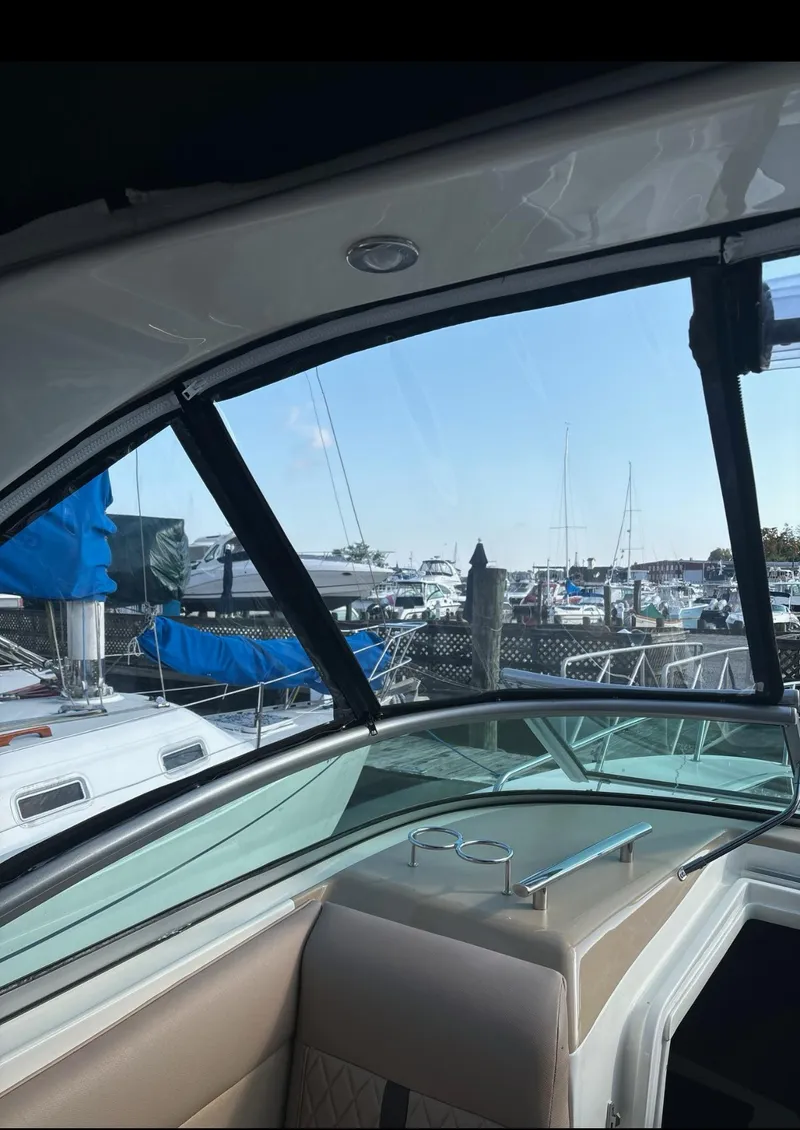 Slide: The Image of 2017 Sea Ray Sundancer 260 at marina, view from interior. - 26