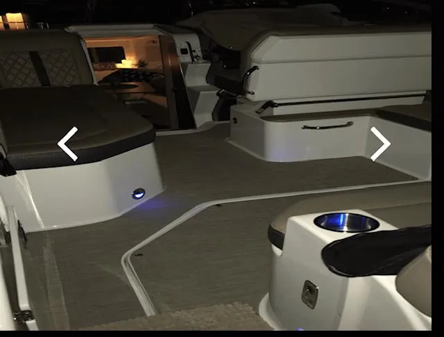Slide: The Image of 2017 Sea Ray Sundancer 260 interior with seating and ambient lighting. - 3