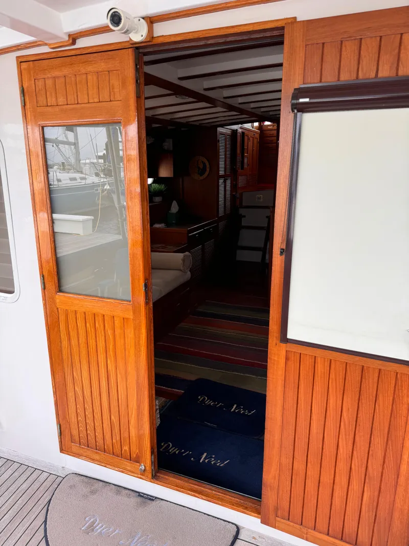 Slide: The Image of Wooden sliding door entrance of 1996 Kadey-Krogen 48 yacht interior. - 29