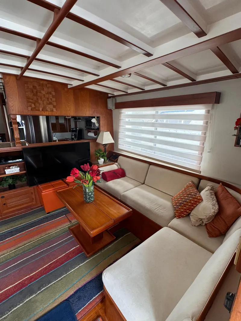 Slide: The Image of Luxurious 1996 Kadey-Krogen 48 yacht interior with cozy seating, vibrant decor, and modern amenities. - 30