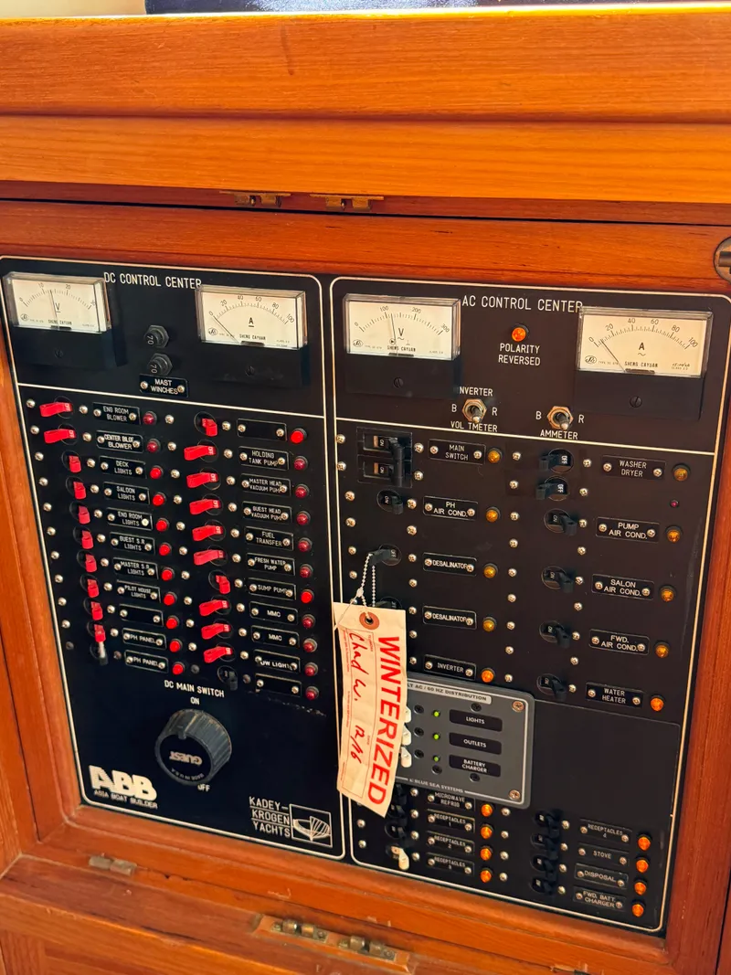 Slide: The Image of Electrical control panel of a 1996 Kadey-Krogen 48 yacht with winterized tag. - 37